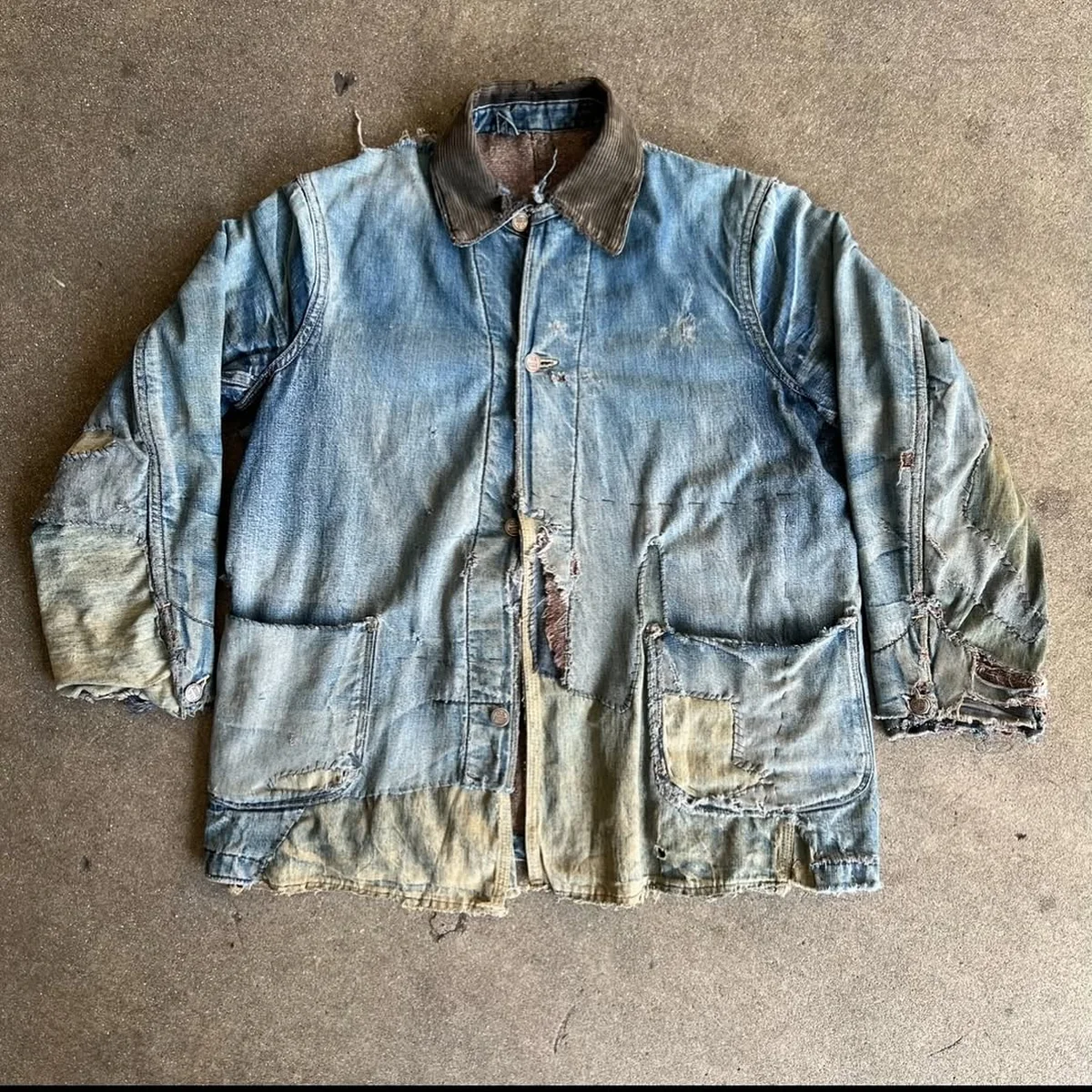Denim jacket with contrasting collar and visible wear